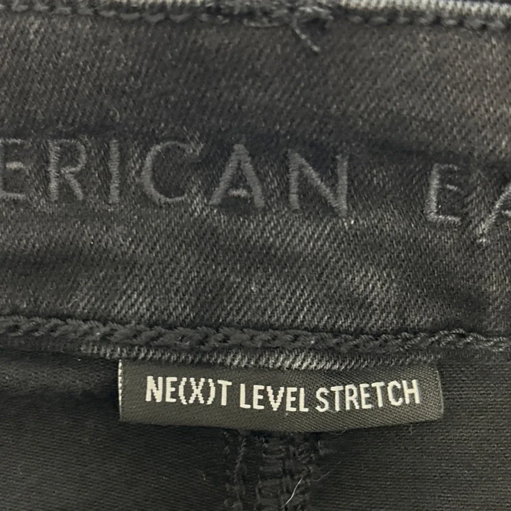 American Eagle Next Level Stretch Curvy Hi-Rise Black Distressed Denim‎ Mini